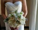 White hydrangeas, garden roses, ranunculus and white tulips